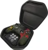 A gaming controller and accessories are displayed inside an open case. Produktbild-Vorschau