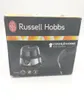 A product box for a Russell Hobbs egg cooker. Produktbild-Vorschau