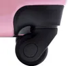 Close-up of a pink suitcase wheel. Podgląd zdjęcia produktu