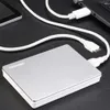 A silver external hard drive connected to a laptop via a white USB cable. Produktbild-Vorschau