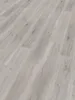 A close-up, angled view of light-colored wood-look flooring planks. Produktbild-Vorschau