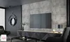 A modern living room with a large TV mounted on a concrete-effect wall, a stylish media console, and comfortable seating. Produktbild-Vorschau