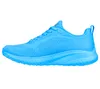 A side view of a single blue sneaker against a white background. Podgląd zdjęcia produktu