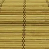 A close-up, textured view of a bamboo blind, showing the woven texture and the individual bamboo slats. Produktbild-Vorschau