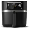 A black Philips air fryer with a digital display and a silver dial. Podgląd zdjęcia produktu