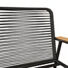 A close-up view of the woven back and armrest of a black outdoor chair with a wooden armrest. Anteprima dell’immagine prodotto