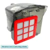 A vacuum cleaner dustbin with a filter attached. Produktbild-Vorschau