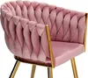 A close-up view of a pink velvet armchair with gold metal legs. Produktbild-Vorschau