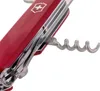 A close-up of a red Swiss Army knife with the corkscrew tool extended. Náhled obrázku produktu