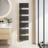 A modern bathroom with a sink, vanity, and a black towel radiator. Náhled obrázku produktu
