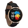 A close-up shot of a smartwatch with a black leather strap and a gold-colored case, displayed against a white background. Podgląd zdjęcia produktu