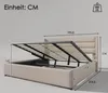 A bed frame with its storage compartment open, showing dimensions and weight capacity. Produktbild-Vorschau