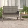 A poly rattan garden bench with cushions sits on a paved patio next to a small table with drinks. Anteprima dell’immagine prodotto