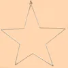 A silver wireframe star ornament against a light peach background. Produktbild-Vorschau