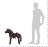A plush toy horse is shown standing next to a silhouette of a person for scale. Náhľad obrázku produktu