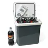 A portable electric cooler box filled with soda bottles, with one bottle placed outside the box. Produktbild-Vorschau
