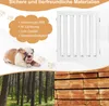 A collage showing a white pet gate, a bulldog puppy, a forest, and stacked lumber. Anteprima dell’immagine prodotto