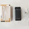 A product shot showing a power bank and its packaging, along with accessories. Produktbild-Vorschau