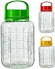 Three glass jars with colored lids are displayed against a white background. The largest jar is in the foreground with a green lid, and two smaller jars are in the background, one with a red lid and the other with a yellow lid. Produktbild-Vorschau
