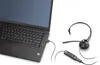 A black monaural headset is connected to a black laptop via a USB cable. Náhled obrázku produktu