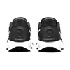 A rear view of a pair of black Nike Star Runner 4 sneakers with white accents, set against a white background. Voir les images du produit