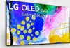 A television screen displaying abstract art and branding. Produktbild-Vorschau