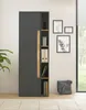 A modern, tall cabinet with a gray exterior and wood accents, featuring open shelving with office supplies and binders. A gray messenger bag rests on the floor next to it. Produktbild-Vorschau