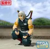 A figure of Tengen Uzui from Demon Slayer is displayed in a crouching pose outdoors. Náhľad obrázku produktu