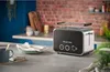 A toaster on a kitchen counter with a mug and plates. Produktbild-Vorschau