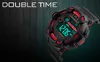 A digital watch is shown on a dark, textured background with text overlay. Podgląd zdjęcia produktu