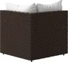A corner piece of a brown rattan sofa with white cushions. Náhľad obrázku produktu
