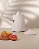 Presse-citron électrique Plissé d'Alessi, blanc Voir les images du produit 9