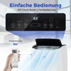 A close-up marketing image of a portable air conditioner's control panel and remote, with a hand holding the remote. Voir les images du produit