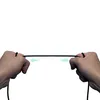 Hands stretching a black audio cable. Náhled obrázku produktu