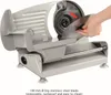 A hand is shown removing the blade from a meat slicer. Náhľad obrázku produktu