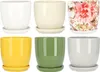 A collage of six ceramic plant pots with saucers, arranged in two rows of three. Náhled obrázku produktu