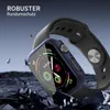 A smartwatch with a protective case is shown on a dark, rocky surface, with fragments of rock flying around it. Produktbild-Vorschau