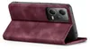 A burgundy flip case for a smartphone is shown from a side angle, propped open. Produktbild-Vorschau
