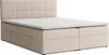 A beige upholstered boxspring bed with a headboard and two storage drawers is shown against a white background. Voir les images du produit