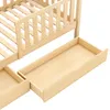 A close-up view of a wooden children's bed frame with two drawers pulled out. Produktbild-Vorschau