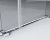 A close-up view of the bottom section of a glass shower enclosure, showing the track and mounting hardware. Produktbild-Vorschau