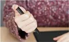 A close-up shot of a hand holding a stylus pen over a tablet. Náhľad obrázku produktu