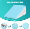 A wedge-shaped pillow with a light blue top layer and a white bottom layer, presented against a teal and white background. Below the pillow are three circular diagrams illustrating the memory foam's recovery time. Náhľad obrázku produktu