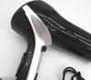 A close-up shot of a black and silver hair dryer. Produktbild-Vorschau