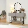 A modern console table with two drawers and a shelf, displayed in a room setting with a chair and decor. Anteprima dell’immagine prodotto