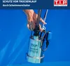A hand holding a submersible pump over blue water. Produktbild-Vorschau