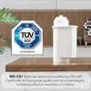 A water filter cartridge is shown on a wooden countertop with a certification badge next to it. Náhled obrázku produktu