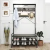 A hallway or entryway with a coat rack and shoe storage unit. Voir les images du produit