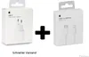 Two Apple product boxes, one for a 20W USB-C power adapter and another for a USB-C to Lightning cable, are shown side-by-side with a plus sign in between them. Produktbild-Vorschau