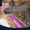 A child is holding a tablet, which is partially wrapped in festive packaging, surrounded by a fuzzy, carpet-like material and candy canes. Produktbild-Vorschau